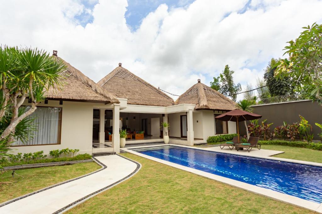 an image of a villa with a swimming pool at The Mutiara Jimbaran Boutique Villas in Jimbaran