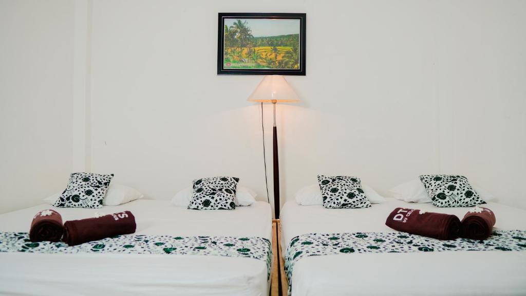Dormitory Sritanjung By Celcius - Chambre Familiale De Luxe