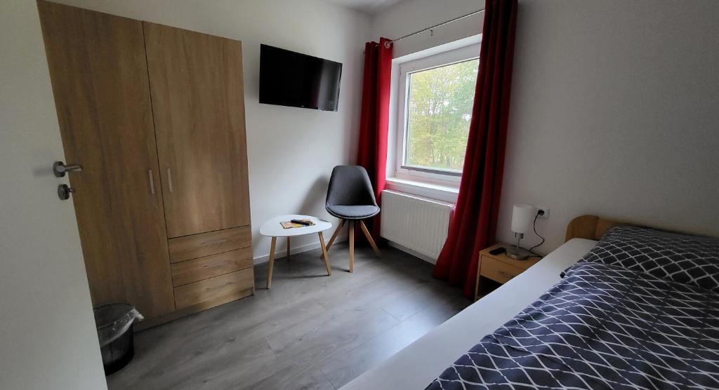 Postel nebo postele na pokoji v ubytování Ullas Gästehaus