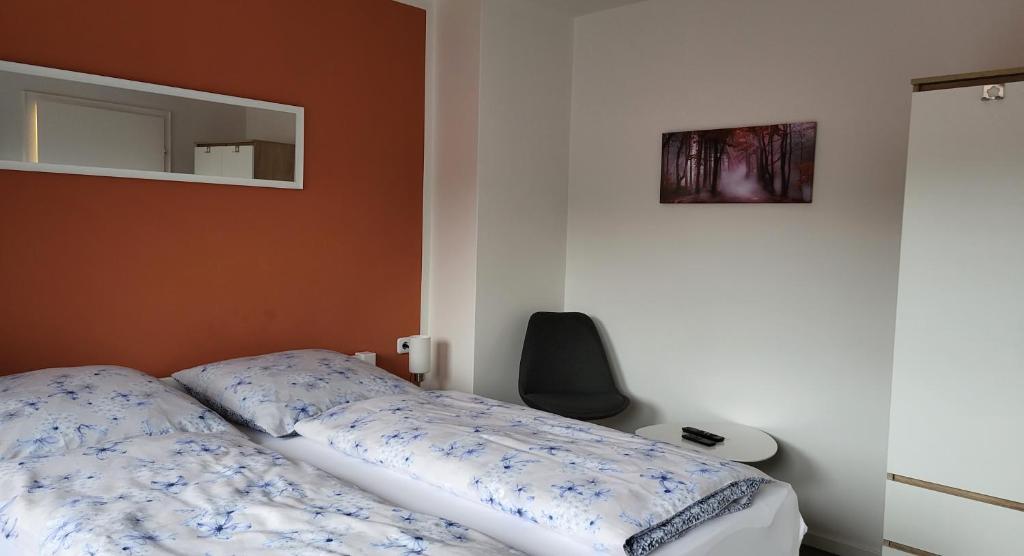 Postel nebo postele na pokoji v ubytování Ullas Gästehaus