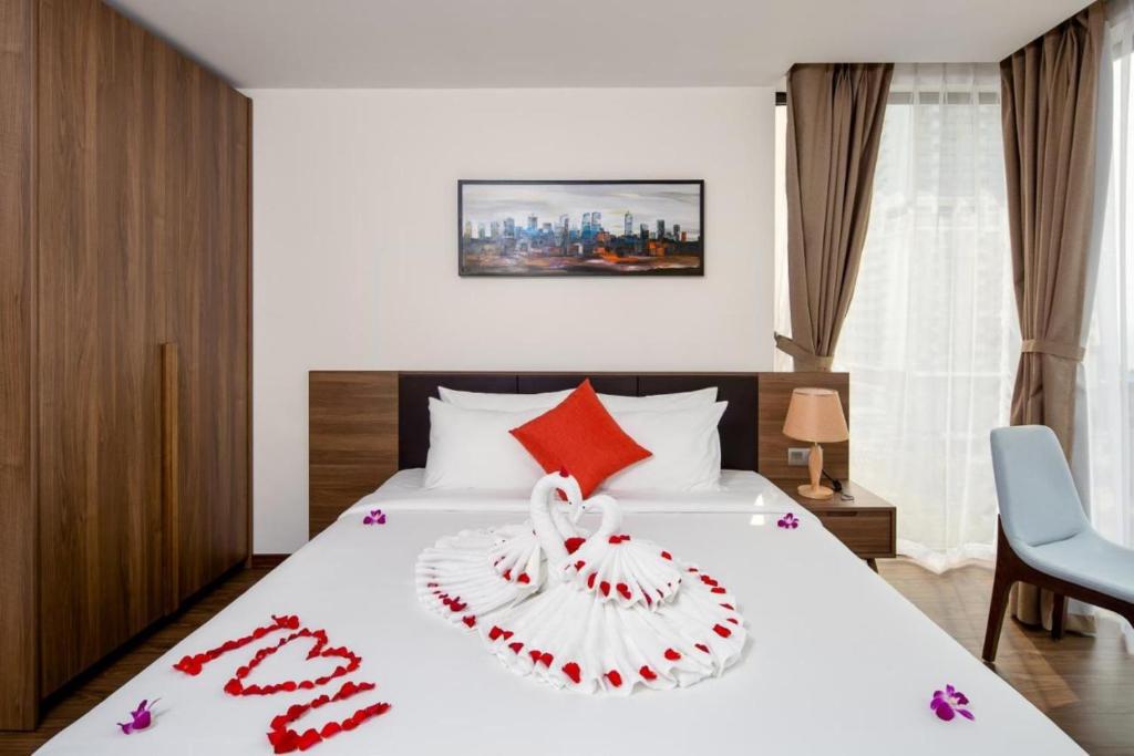 Postel nebo postele na pokoji v ubytování Amunra Ocean Hotel