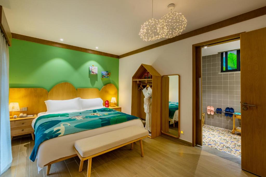 Postel nebo postele na pokoji v ubytování Little Hakka Hotel
