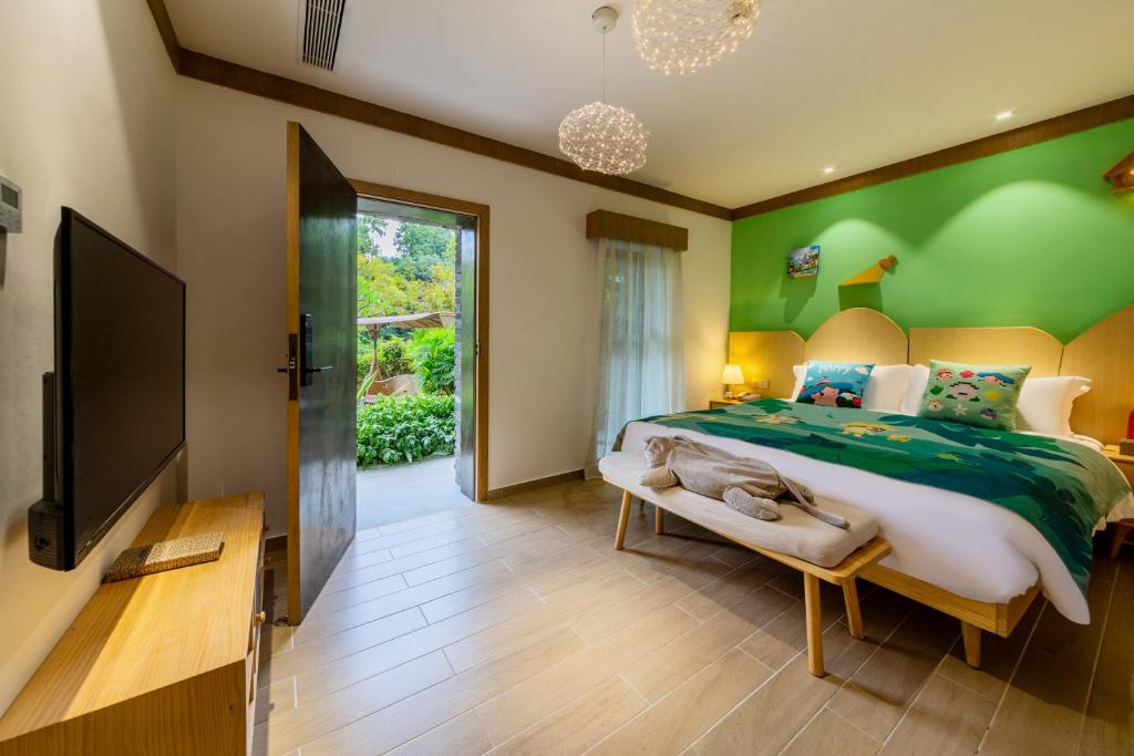 TV a/nebo společenská místnost v ubytování Little Hakka Hotel