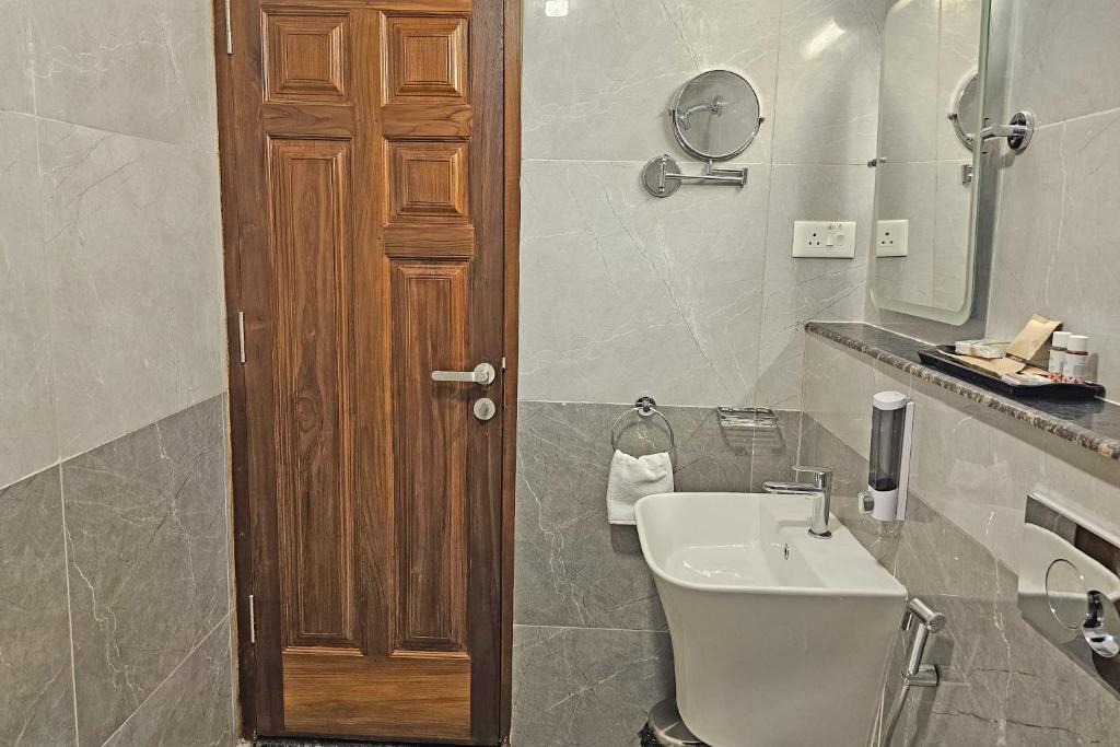Koupelna v ubytování Le Colonial Suites