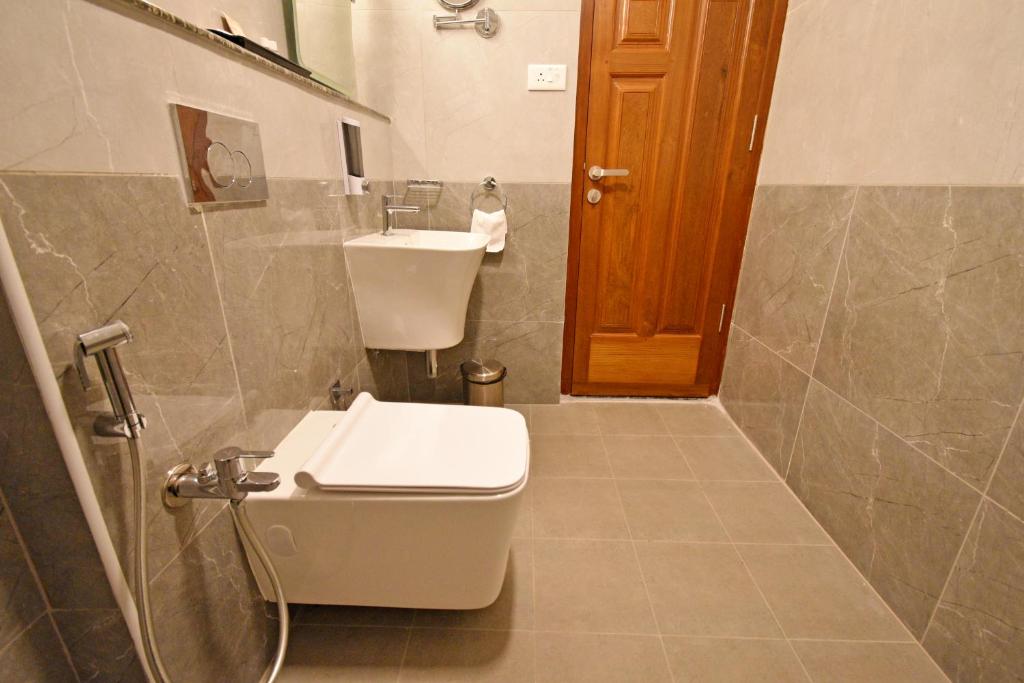 Koupelna v ubytování Le Colonial Suites