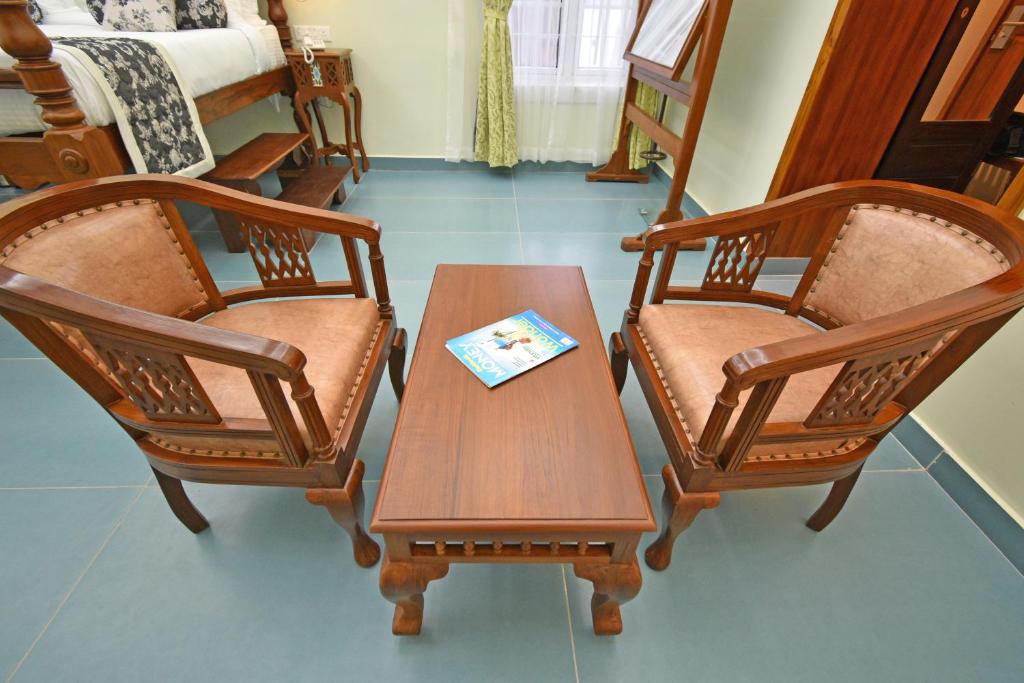 Posezení v ubytování Le Colonial Suites
