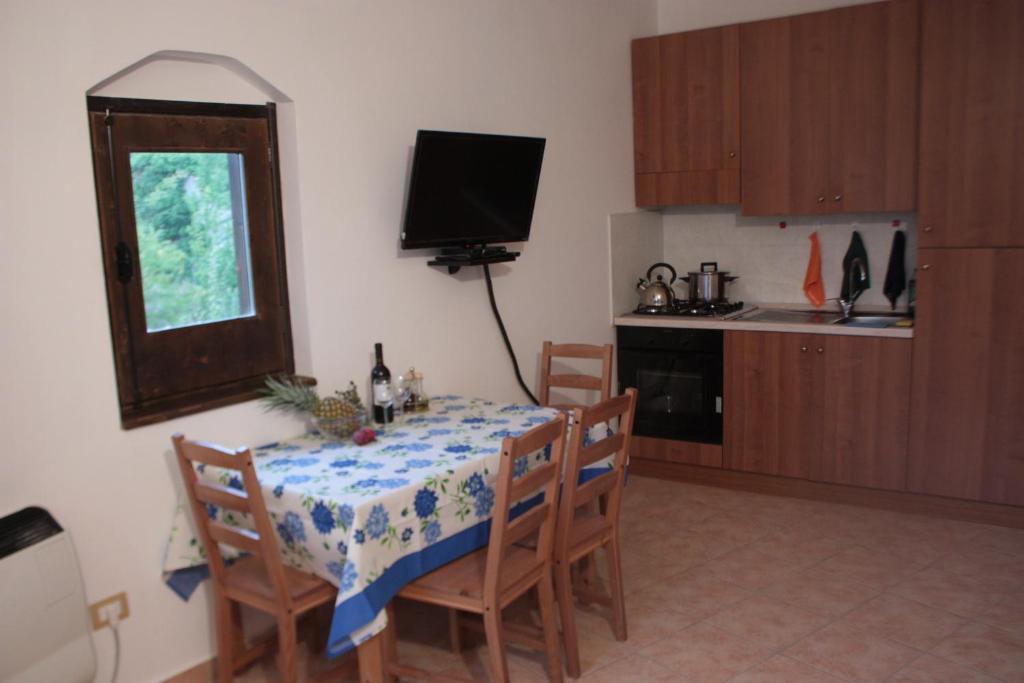 Kuchyň nebo kuchyňský kout v ubytování Lorica Apartment Residence LagoSila