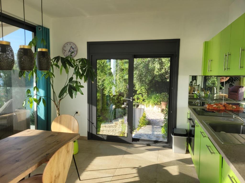 Kuchyň nebo kuchyňský kout v ubytování Villa Olivia