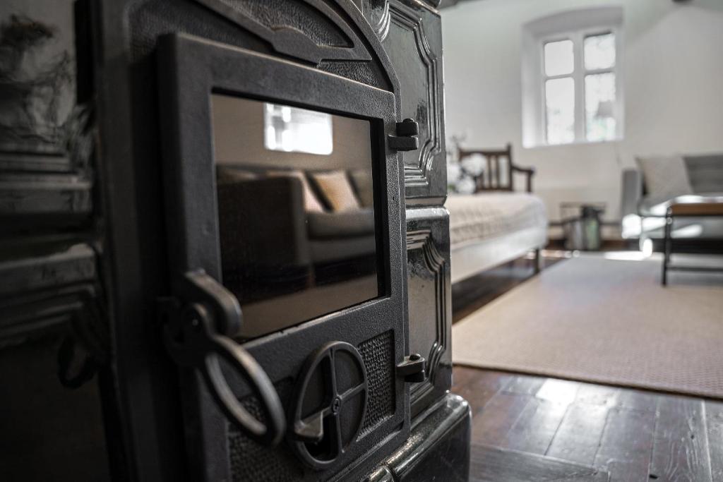 Postel nebo postele na pokoji v ubytování Százéves ház - Vérteskozma 48