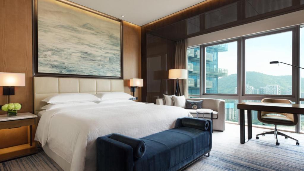 Postel nebo postele na pokoji v ubytování Sheraton Zhuhai Hotel