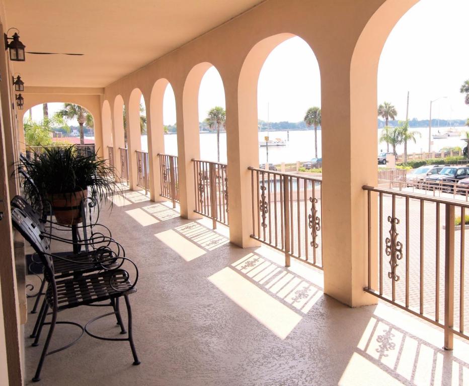 a balcony with a view of the water at Bayfront Inn in St. Augustine