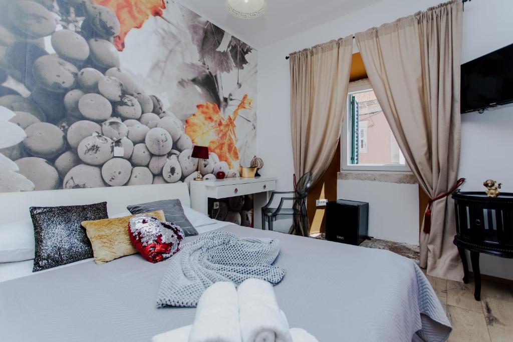 Postel nebo postele na pokoji v ubytování Guesthouse Mimbelli
