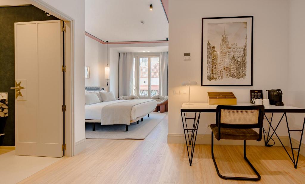 Postel nebo postele na pokoji v ubytování Apartamentos Soho Boutique Hoy No Me Puedo Levantar