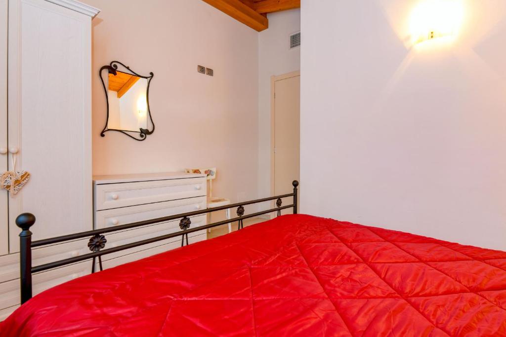 Postel nebo postele na pokoji v ubytování Albicocca