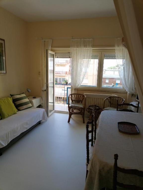 A bed or beds in a room at Luminoso Appartamento A 80 Metri dal Mare