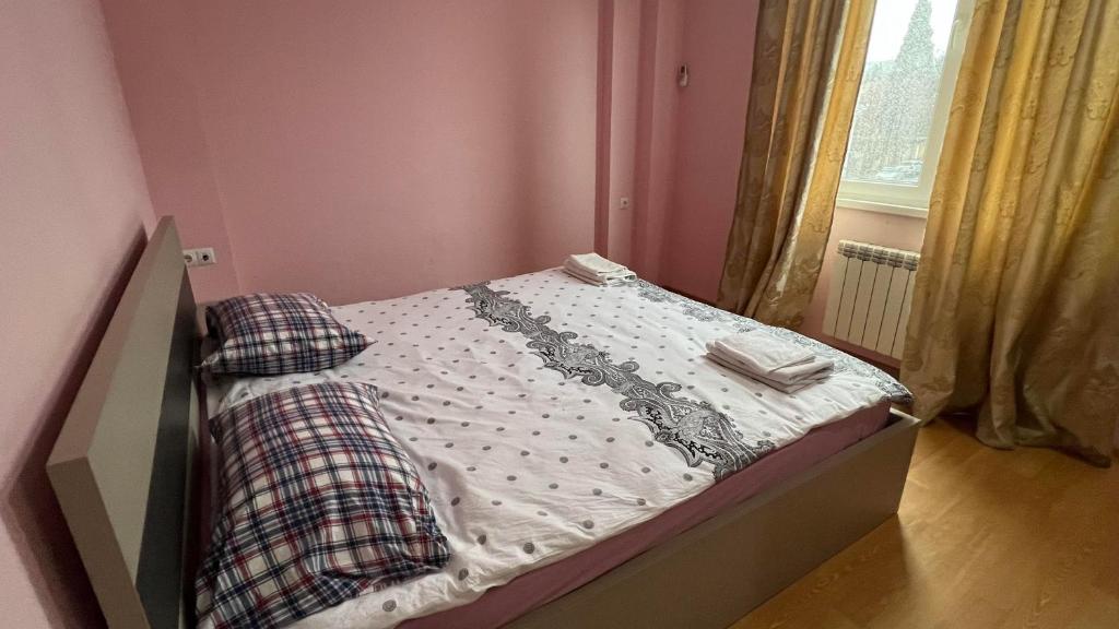Postel nebo postele na pokoji v ubytování Rest House Tbilisi