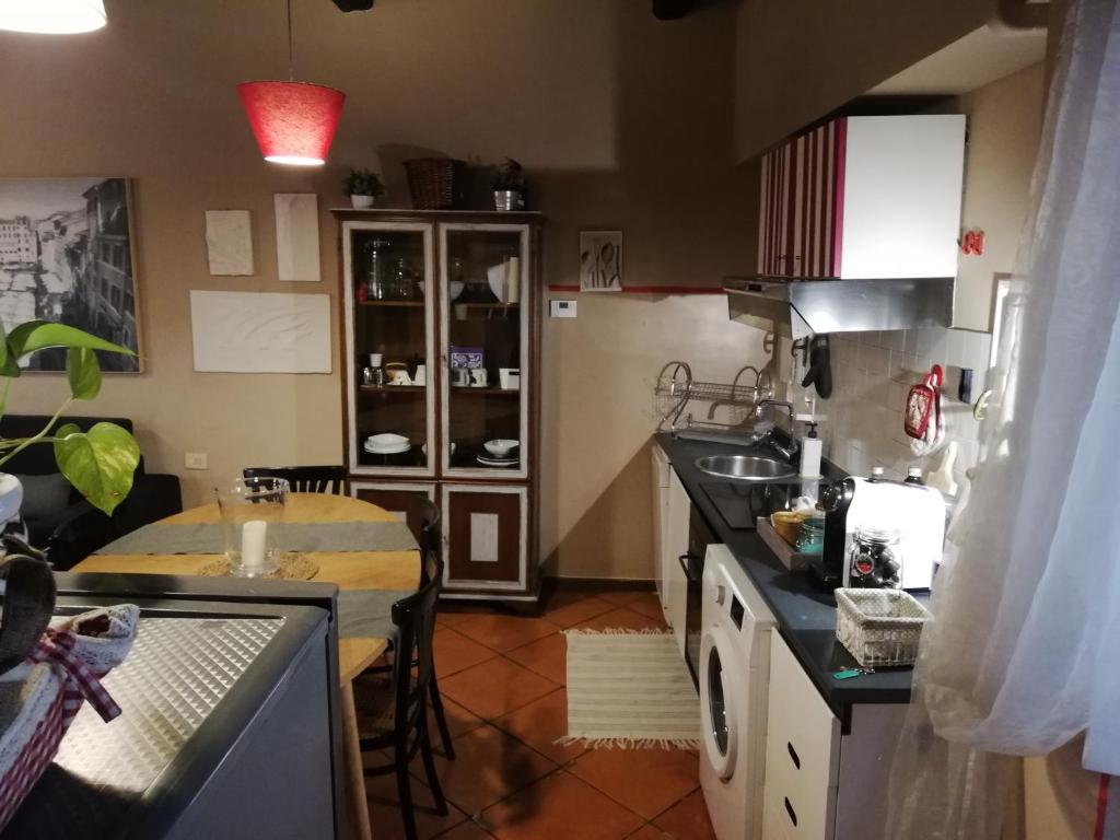 A kitchen or kitchenette at Apartments Campo de Fiori