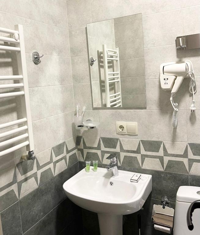 Koupelna v ubytování ART family hotel
