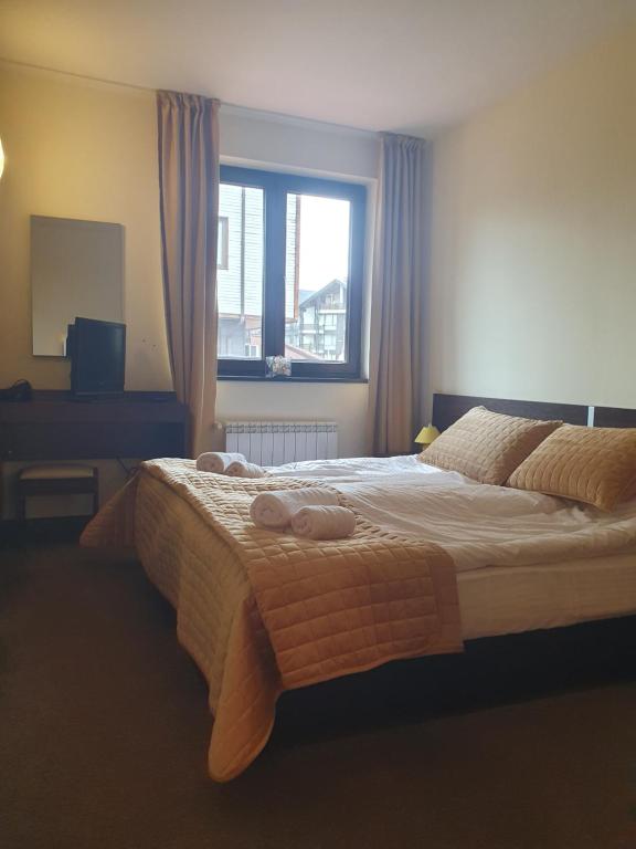 Postel nebo postele na pokoji v ubytování Apartment ZAX B7 in Terra Complex
