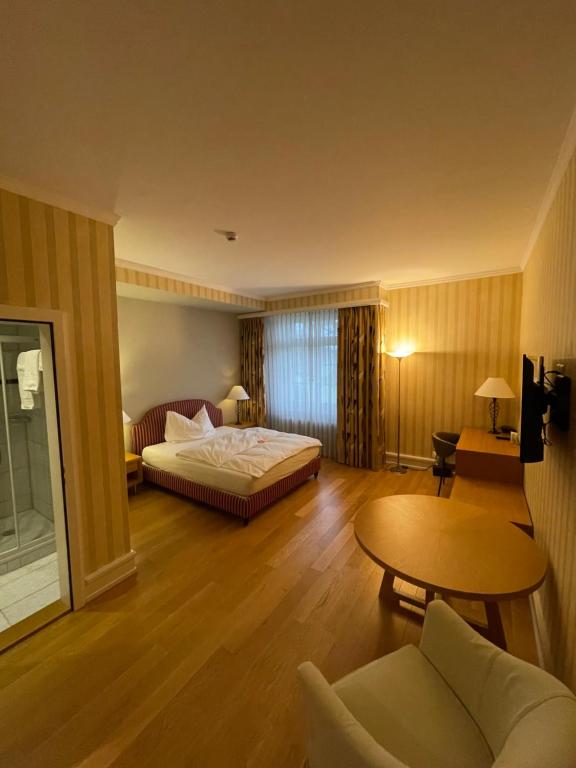 Postel nebo postele na pokoji v ubytování Parkforum Wylihof