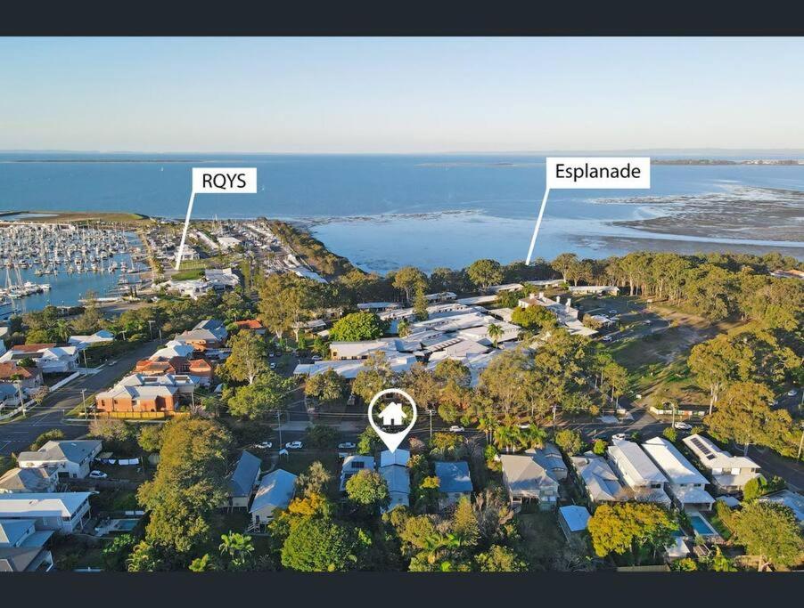 an aerial view of a suburb with a harbor at 3BR15BA House w Parking Close to Eastwood Beach M8 in Brisbane