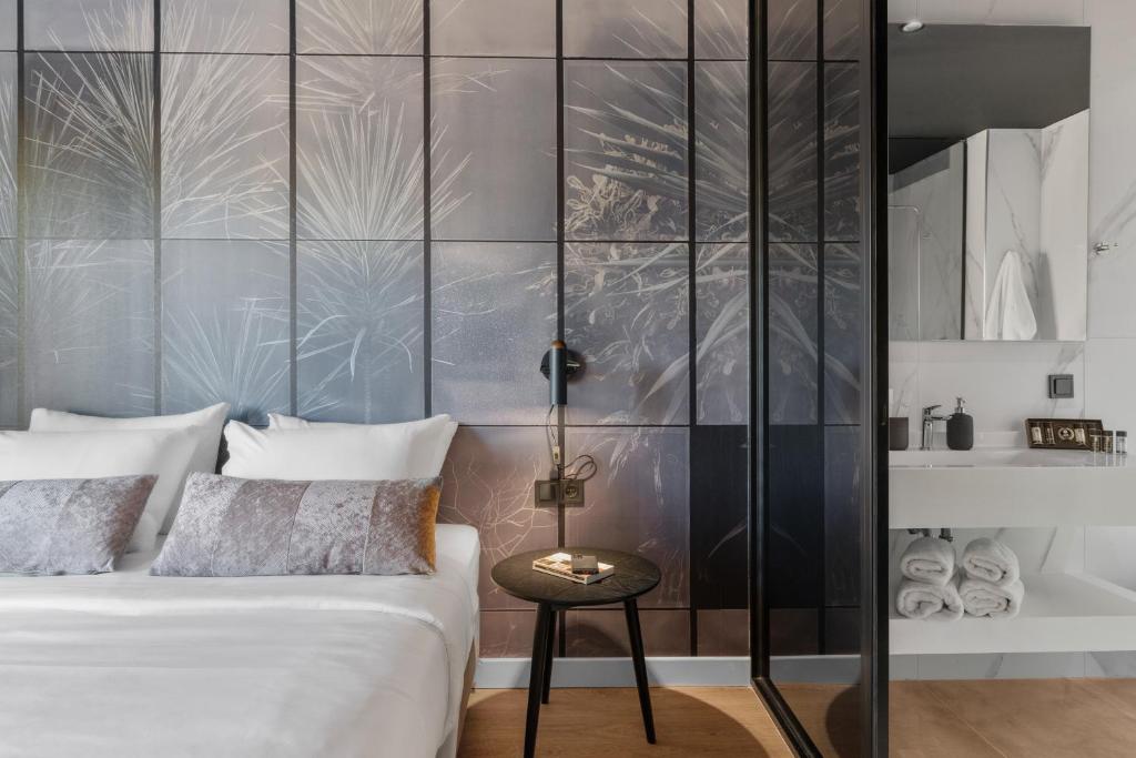Postel nebo postele na pokoji v ubytování Azur Hotel Volos