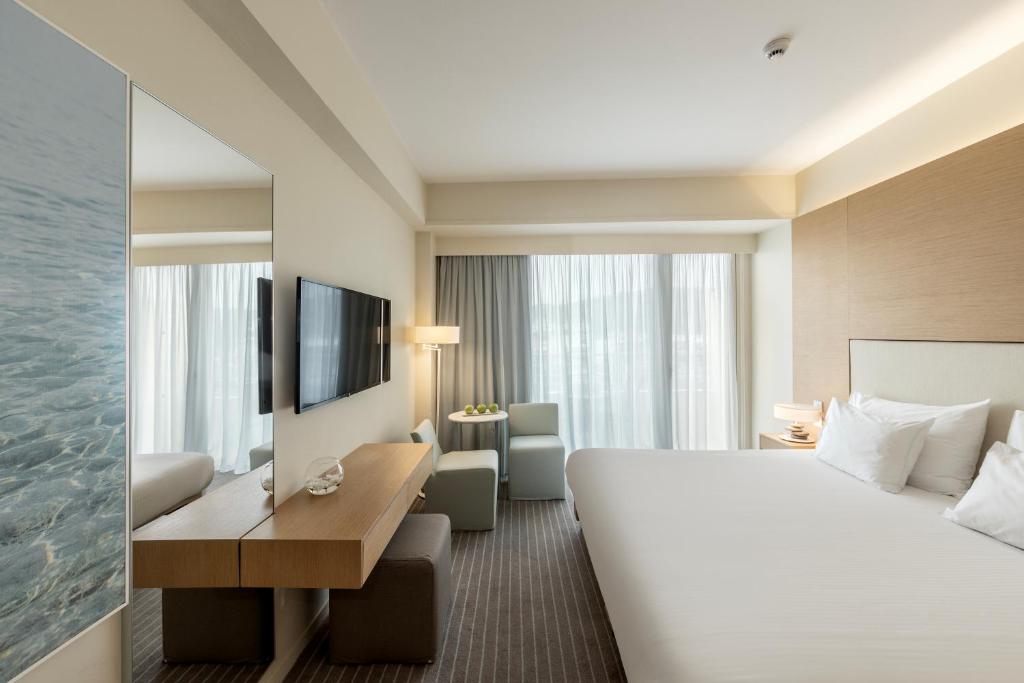 Capo Bay Hotel - Family Room With Side Sea View