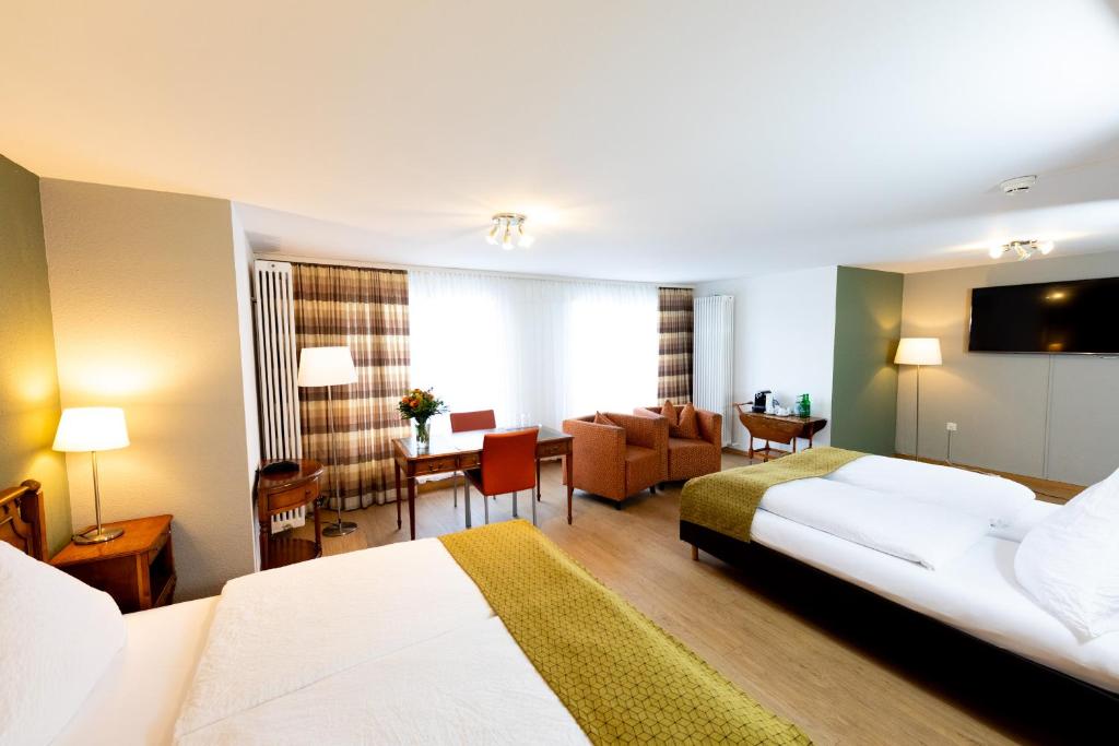Postel nebo postele na pokoji v ubytování Hotel Alfa