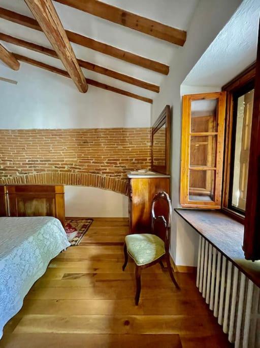 Posteľ alebo postele v izbe v ubytovaní Il Colle - Apartment Pino