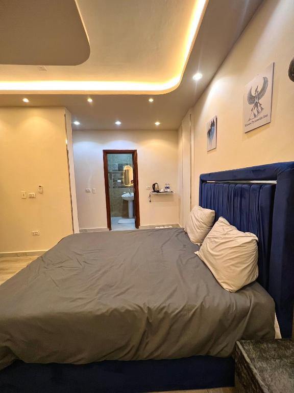 Letto o letti in una camera di Moses Pyramids Inn