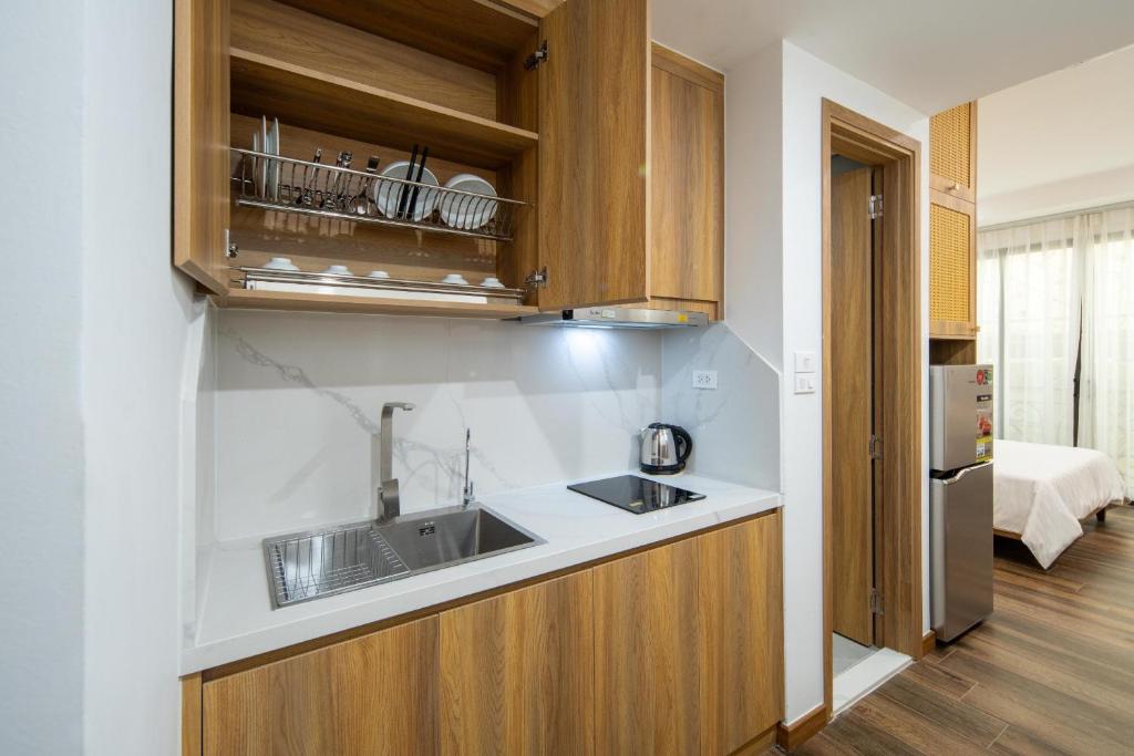 Kuchyň nebo kuchyňský kout v ubytování Studio-Vincent Apartment HaNoi