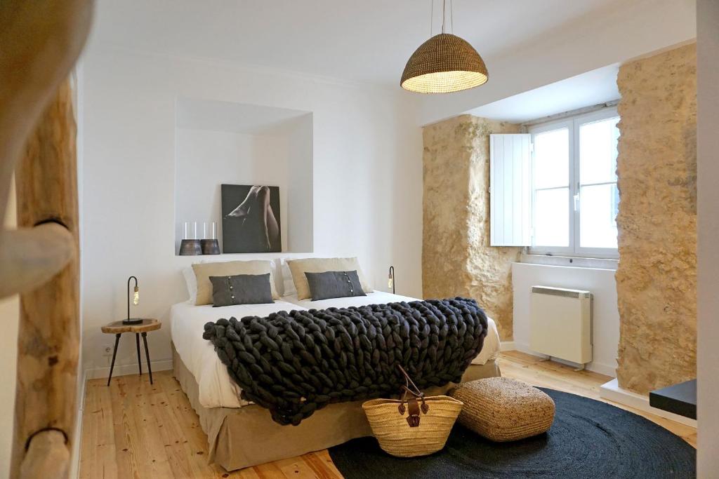 Postelja oz. postelje v sobi nastanitve Sonel Investe Anjos Boutique Apartments by Get Your Stay