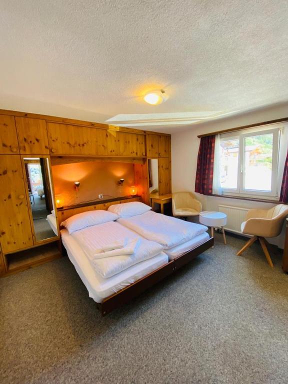 Postel nebo postele na pokoji v ubytování Hotel Old JNN