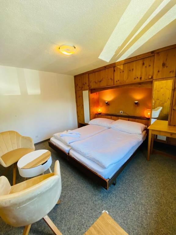 Postel nebo postele na pokoji v ubytování Hotel Old JNN