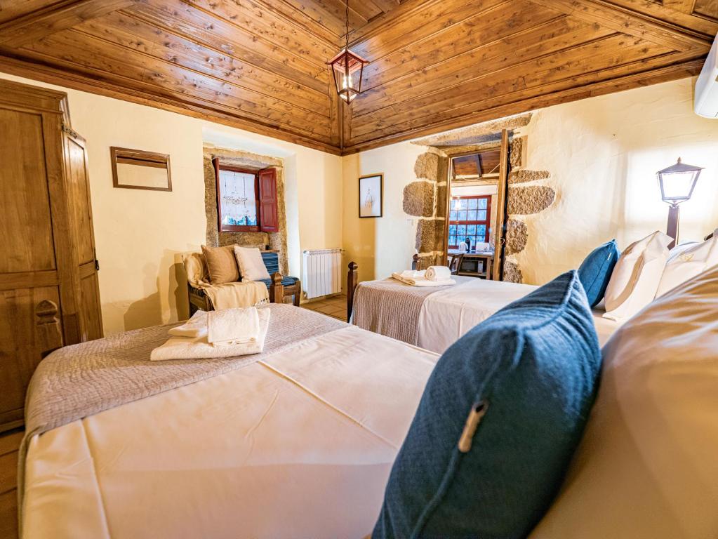 Postel nebo postele na pokoji v ubytování Cantinho d'Azenha