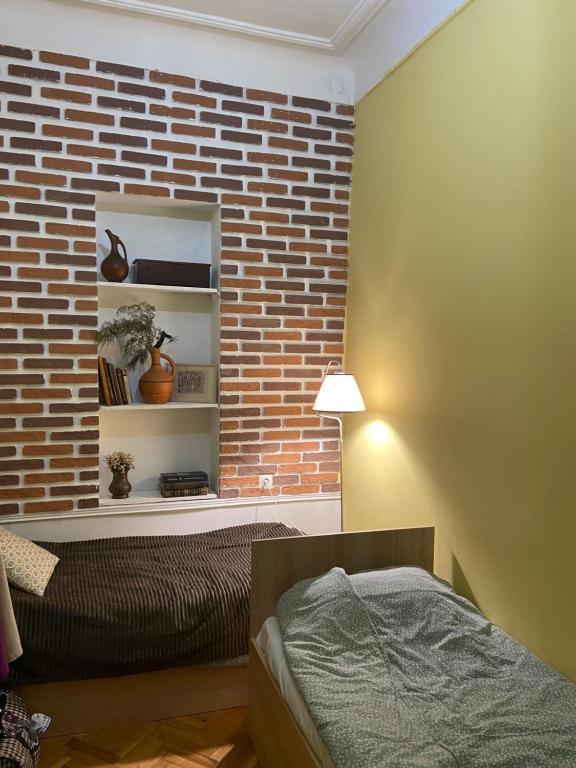 Postel nebo postele na pokoji v ubytování Hostel ERA