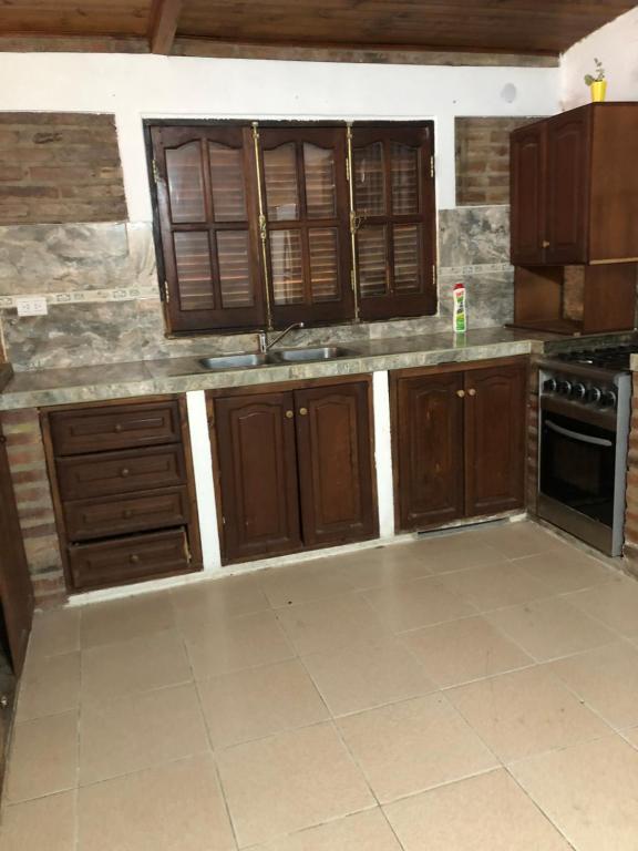 Kuchyň nebo kuchyňský kout v ubytování Casa los aromo