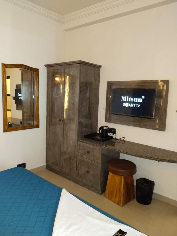Postel nebo postele na pokoji v ubytování Hotel AK International - Chennai