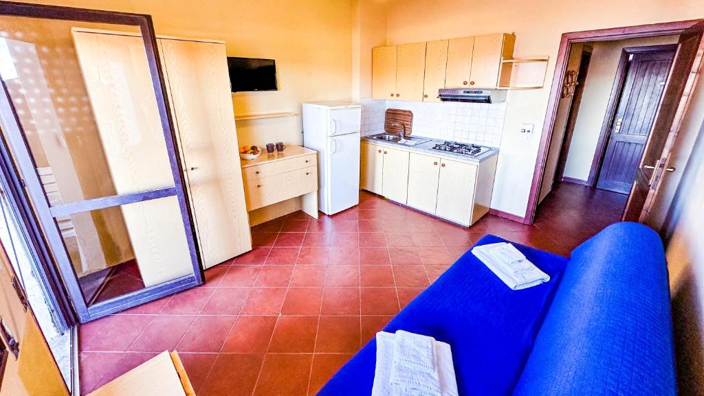 Кухня или мини-кухня в Residence Hotel La Pelosetta
