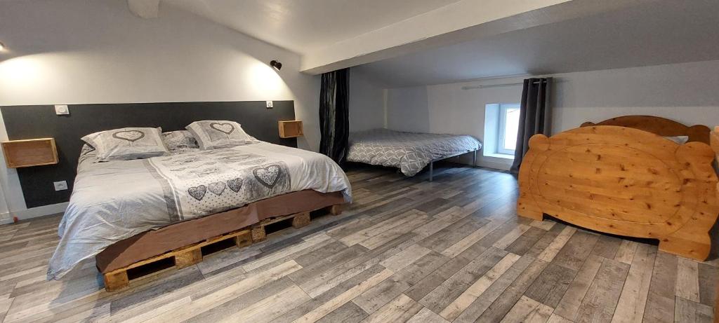 Posteľ alebo postele v izbe v ubytovaní Gîte avec Piscine Proche de Carcassonne