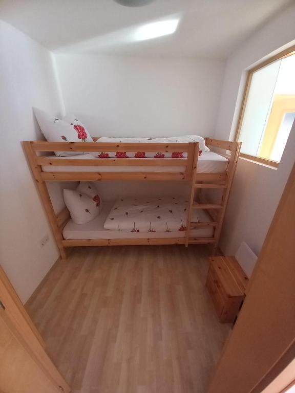 Postel nebo postele na pokoji v ubytování Haus am Waldrand