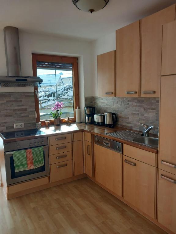 Kuchyň nebo kuchyňský kout v ubytování Haus am Waldrand