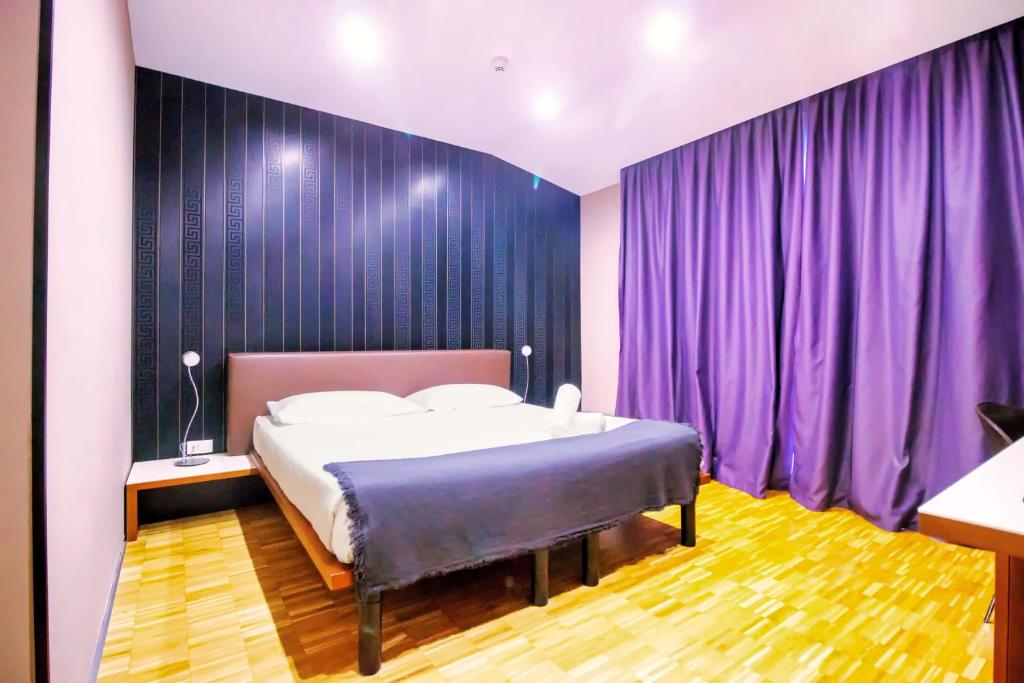 Postel nebo postele na pokoji v ubytování Black Hotel