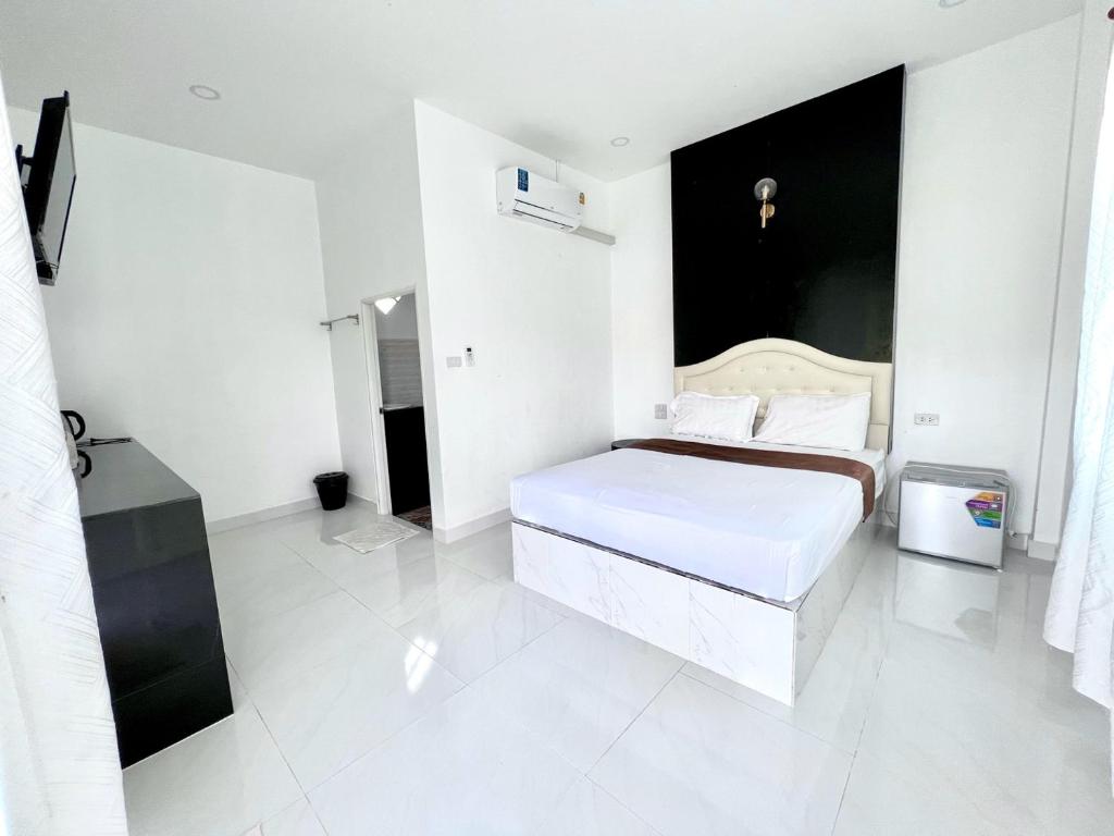 Postel nebo postele na pokoji v ubytování Rim Suan Resort