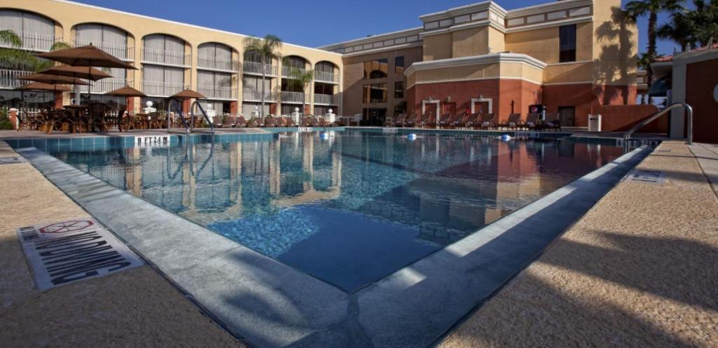 a swimming pool in front of a building at Westgate Towers Resort in Orlando