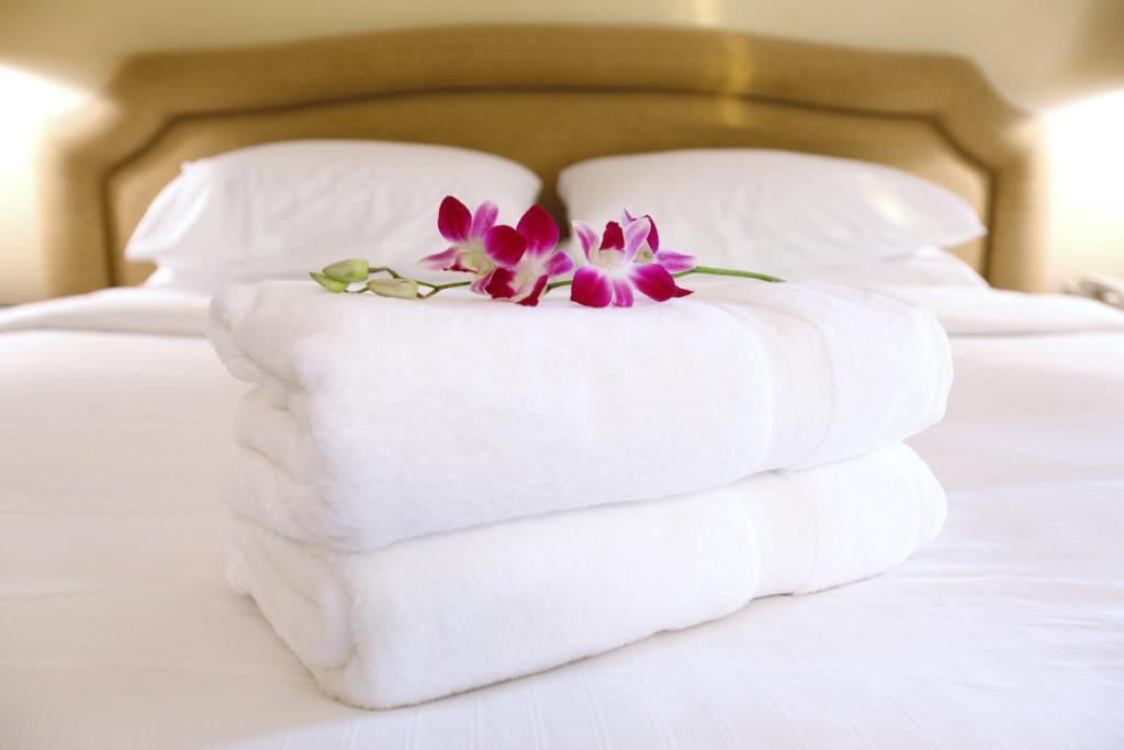 A bed or beds in a room at Villa Bellini Room&Breakfast