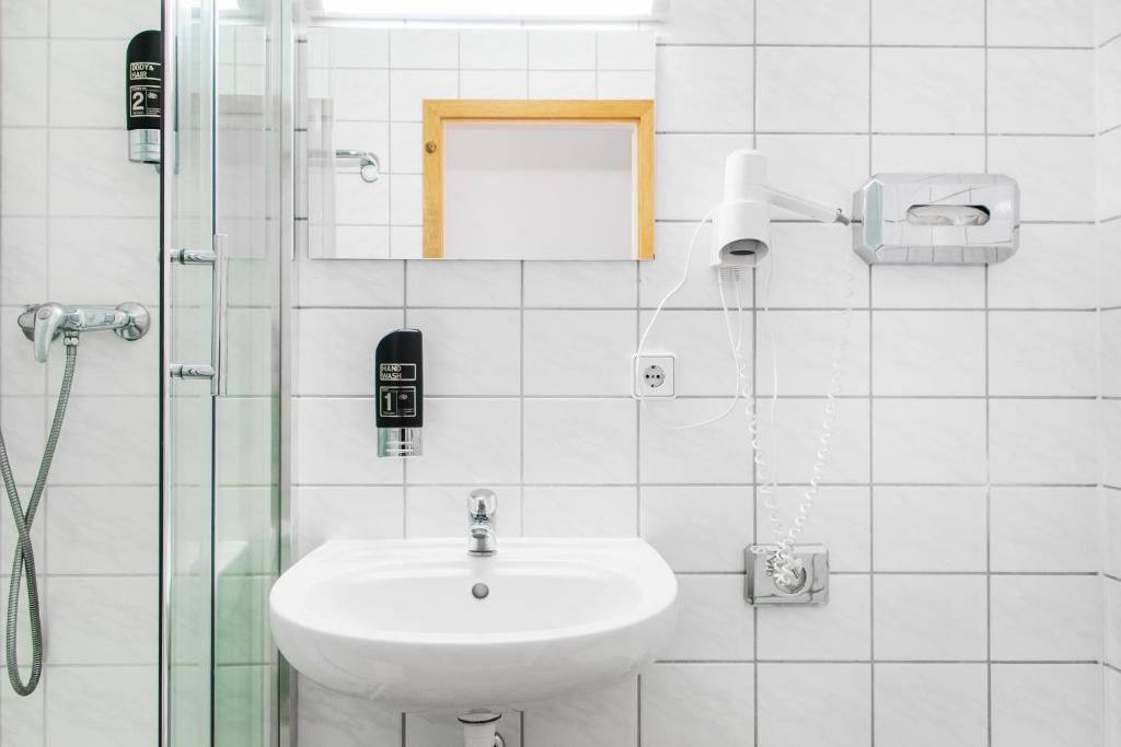 Koupelna v ubytování Hotel BELLEVUE am Kurfürstendamm