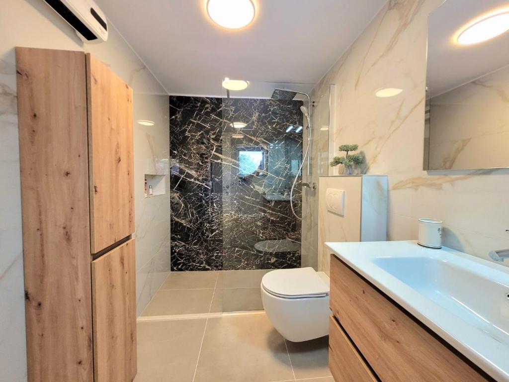Kúpeľňa v ubytovaní Holiday Home Markic by Interhome