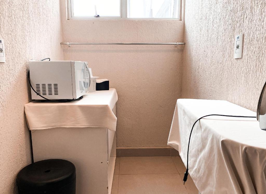 Postel nebo postele na pokoji v ubytování Tarobá Express
