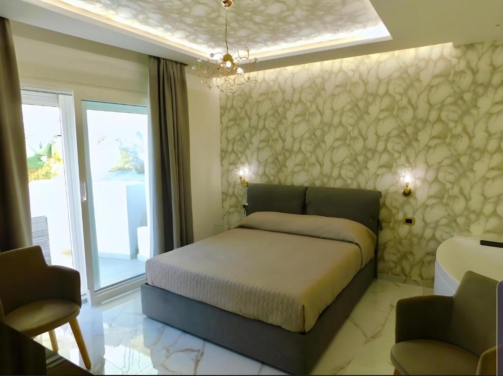 Postel nebo postele na pokoji v ubytování Suite Èlite Rooms